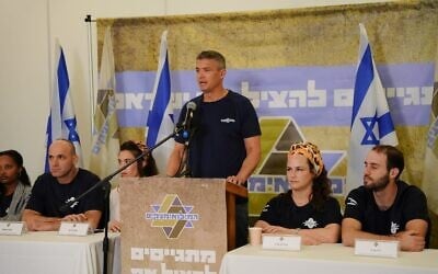 Yoaz Hendel speaking at a press conference for his HaMiluimnikim party, November 19, 2025. (Courtesy) Yoaz Hendel speaking at a press conference for his HaMiluimnikim party, November 19, 2025. (Courtesy)