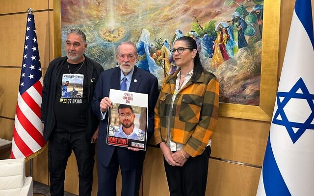 Itzik Gvili, left, and Talik Gvili, right, the parents of Ran Gvili, whose body is held captive in Gaza, meet with US Ambassador to Israel Mike Huckabee, center, on November 28, 2025. (Hostages Families Forum) Itzik Gvili, left, and Talik Gvili, right, the parents of Ran Gvili, whose body is held captive in Gaza, meet with US Ambassador to Israel Mike Huckabee, center, on November 28, 2025. (Hostages Families Forum)