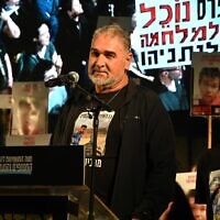 Itzik Gvili, the father of slain hostage Ran Gvili, speaks at Hostages Square, in Tel Aviv, on November 29, 2025. (Uriel Even Sapir/The Hostages and Missing Families Forum)