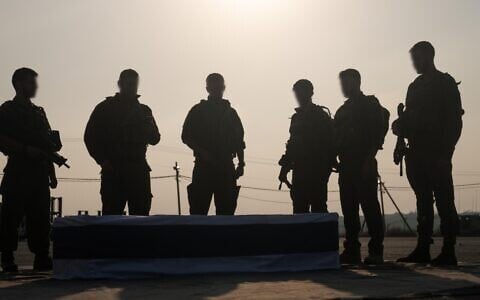Comrades of Lt. Hadar Goldin escort a casket containing his remains out of the Gaza Strip after they were returned by Hamas on November 9, 2025. (Israel Defense Forces)