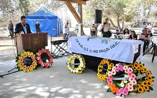 President Isaac Herzog pays tribute to slain hostage Amiram Cooper at his funeral in Nir Oz on November 2, 2025. (Uriel Even-Sapir/ Hostages and Missing Families Forum)