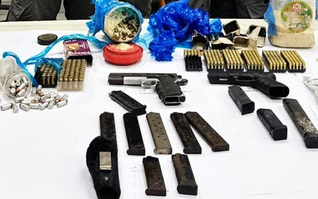 Handguns, magazines and ammunition discovered at a construction site in the northern town of Arraba on November 22, 2025. (Israel Police) Handguns, magazines and ammunition discovered at a construction site in the northern town of Arraba on November 22, 2025. (Israel Police)