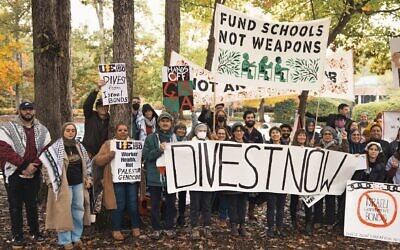 Demonstrators with Break the Bonds North Carolina holding signs demanding divestment form Israel, outside of the State Treasurer’s Office, Raleigh, North Carolina, on October 29, 2025. (Jon Warlick media) Demonstrators with Break the Bonds North Carolina holding signs demanding divestment form Israel, outside of the State Treasurer’s Office, Raleigh, North Carolina, on October 29, 2025. (Jon Warlick media)