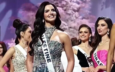 Miss Israel, Melanie Shiraz, looks in the direction of Miss Palestine, Nadeen Ayoub, at the 2025 Miss Universe pageant in Thailand in November 2025. (Screenshot from social media)