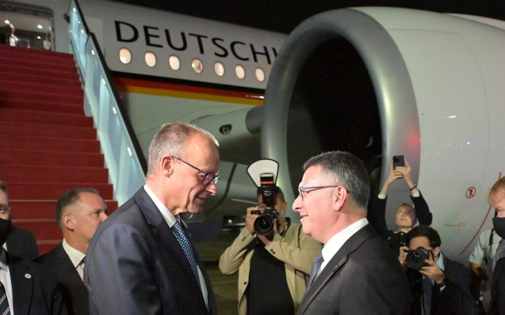 Foreign Minister Gideon Sa’ar (R) receives German Chancellor Friedrich Merz at Ben Gurion Airport, on December 6, 2025. (Shlomi Amselam/GPO) Foreign Minister Gideon Sa’ar (R) receives German Chancellor Friedrich Merz at Ben Gurion Airport, on December 6, 2025. (Shlomi Amselam/GPO)