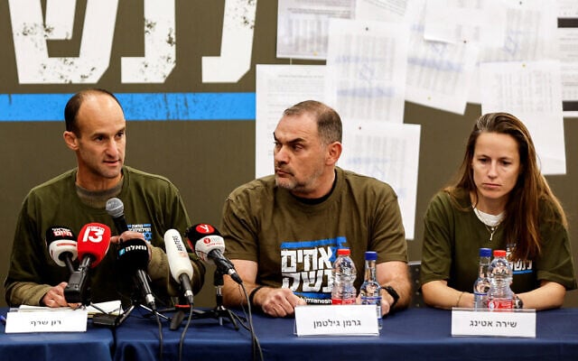 Col. (res.) German Giltman (center) is seen with other members of the 'Brothers in Arms' reservist protest group, during a press conference in Tel Aviv, March 21, 2023. (REUTERS/Amir Cohen) Col. (res.) German Giltman (center) is seen with other members of the 'Brothers in Arms' reservist protest group, during a press conference in Tel Aviv, March 21, 2023. (REUTERS/Amir Cohen)