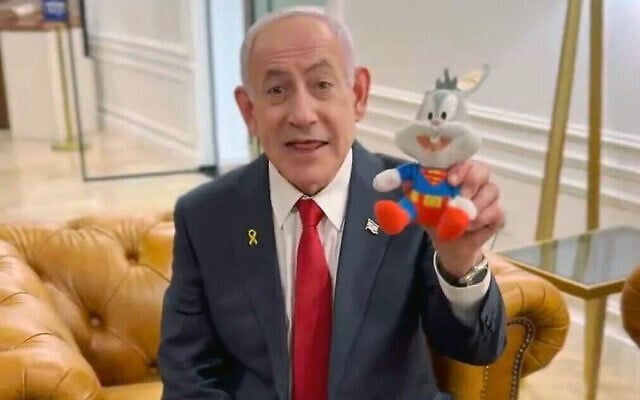 Prime Minister Benjamin Netanyahu holds up a Bugs Bunny doll in a video decrying his ongoing trial on corruption charges, December 4, 2025. (X screenshot) Prime Minister Benjamin Netanyahu holds up a Bugs Bunny doll in a video decrying his ongoing trial on corruption charges, December 4, 2025. (X screenshot)