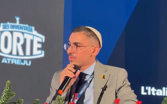 Freed hostage Rom Braslavski speaks at the "Atreju" conference of the Fratelli D'Italia party in Rome, on December 7, 2025. (Screenshot via alanews on YouTube) Freed hostage Rom Braslavski speaks at the "Atreju" conference of the Fratelli D'Italia party in Rome, on December 7, 2025. (Screenshot via alanews on YouTube)