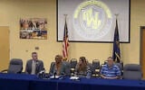 Wissahickon Superintendent of Schools Mwenyewe Dawan (second from left) and School Board President Amy Ginsburg (third from left) speak at a press conference on December 19, 2025. (Screenshot via JTA)