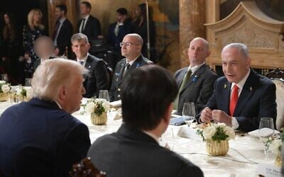 Prime Minister Benjamin Netanyahu (right) and US President Donald Trump (left, foreground) meet with their teams at Mar-a-Lago in Florida, December 29, 2025. On the left in the background (seated, unblurred) is Israeli-American businessman Michael Eisenberg, Netanyahu's pointman to the Civil-Military Coordination Center in Kiryat Gat. (Amos Ben Gershom/GPO) Prime Minister Benjamin Netanyahu (right) and US President Donald Trump (left, foreground) meet with their teams at Mar-a-Lago in Florida, December 29, 2025. On the left in the background (seated, unblurred) is Israeli-American businessman Michael Eisenberg, Netanyahu's pointman to the Civil-Military Coordination Center in Kiryat Gat. (Amos Ben Gershom/GPO)