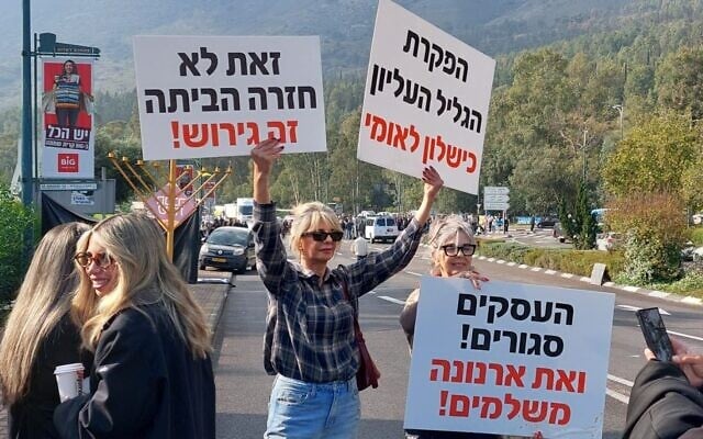 Sima Alok, resident of Kiryat Shmona, protests the 'abandonment' of the northern border city, December 16, 2025. (Diana Bletter/Times of Israel)