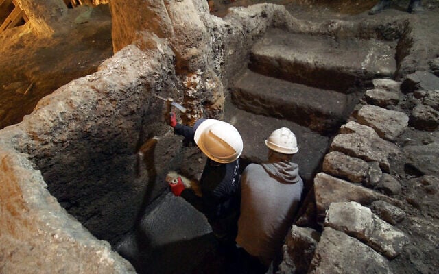 A 2000-year-old ritual bath is unearthed beneath the Western Wall Plaza in a discovery announced on December 29, 2025. (Emil Aladjem/Israel Antiquities Authority)