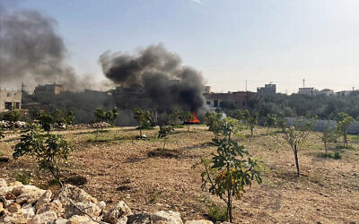 Illegal burning of electronic waste near Azzoun, northern West Bank, November 24, 2025. (Sue Surkes/Times of Israel)