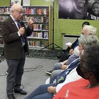 Screen capture from video of Holocaust survivor Sami Steigmann giving a lecture, 2022. (YouTube)