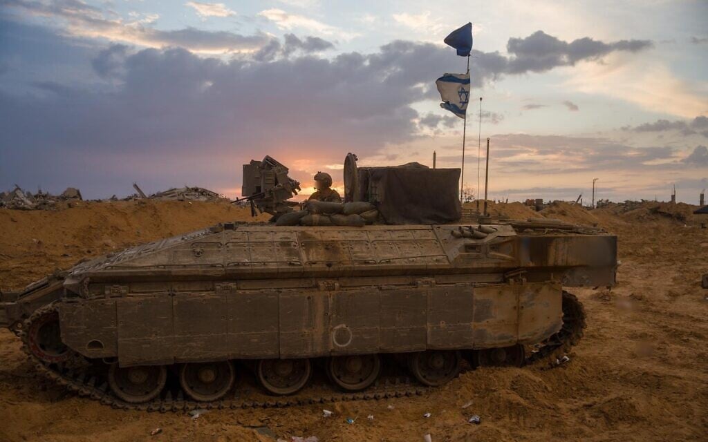 IDF troops in a tank operate in eastern Rafah in the southern Gaza Strip, in the Yellow Line area, in a photo released by the army on December 15, 2025. (IDF) IDF troops in a tank operate in eastern Rafah in the southern Gaza Strip, in the Yellow Line area, in a photo released by the army on December 15, 2025. (IDF)
