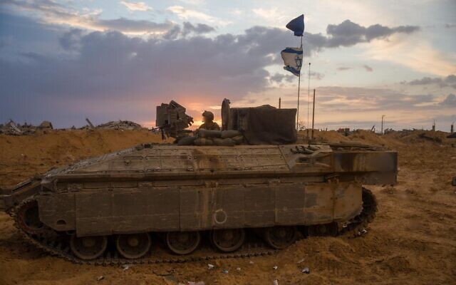 IDF troops in a tank operate in eastern Rafah in the southern Gaza Strip, in the Yellow Line area, in a photo released by the army on December 15, 2025. (IDF)
