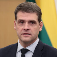 Leader of the Lithuanian Nemuno Aušra party Remigijus Žemaitaitis speaks during a press conference after the signing of a coalition agreement in Vilnius, Lithuania, on November 11, 2024. (Petras Malukas / AFP)