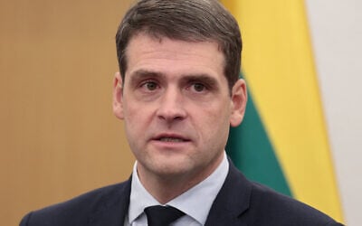 Leader of the Lithuanian Nemuno Aušra party Remigijus Žemaitaitis speaks during a press conference after the signing of a coalition agreement in Vilnius, Lithuania, on November 11, 2024. (Petras Malukas / AFP)