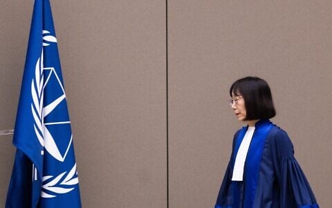 Judge Tomoko Akane arrives prior to the announcement of the International Criminal Court (ICC) verdict that sentenced Malian Jihadist police chief Al Hassan Ag Abdoul Aziz Ag Mohamed Ag Mahmoud to 10 years in jail for war crimes and crimes against humanity, on November 20, 2024 at the ICC court in The Hague. (Eva Plevier/various sources/AFP)