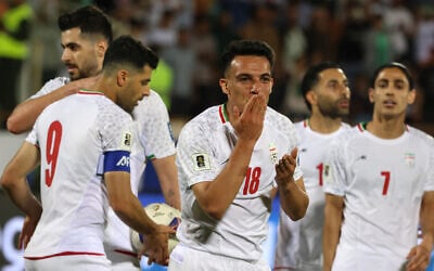 Iran's midfielder #18 Amirhossein Hosseinzadeh celebrates scoring his team's third goal during the FIFA World Cup 2026 Asia zone qualifiers group A football match between Iran and the North Korea at the Azadi Sports Complex in Tehran on June 10, 2025. (Photo by ATTA KENARE / AFP) Iran's midfielder #18 Amirhossein Hosseinzadeh celebrates scoring his team's third goal during the FIFA World Cup 2026 Asia zone qualifiers group A football match between Iran and the North Korea at the Azadi Sports Complex in Tehran on June 10, 2025. (Photo by ATTA KENARE / AFP)