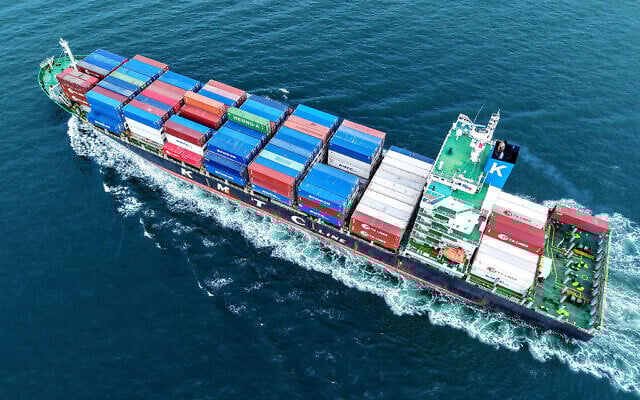 Illustrative: A cargo ship loaded with containers leaves the port in Qingdao, China, on July 8, 2025. (AFP)