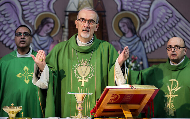 Cardinal Pierbattista Pizzaballa, Latin Patriarch of Jerusalem, leads prayers at the Sunday morning mass at the Roman Catholic Church of the Holy Family in Gaza City on July 20, 2025. (Omar AL-QATTAA / AFP)