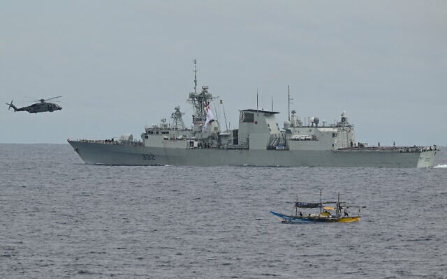 A CH-148 Cyclone helicopter approaches the Royal Canadian Navy frigate HMCS Ville de Quebec for landing during a maritime cooperative activity between the Philippines, Australia and Canadian navies near Scarborough Shoal in disputed waters of the South China Sea on September 2, 2025. (Ted ALJIBE / AFP) A CH-148 Cyclone helicopter approaches the Royal Canadian Navy frigate HMCS Ville de Quebec for landing during a maritime cooperative activity between the Philippines, Australia and Canadian navies near Scarborough Shoal in disputed waters of the South China Sea on September 2, 2025. (Ted ALJIBE / AFP)