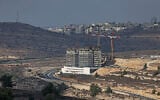 A building under construction is pictured in the West Bank settlement of Givat Ze'ev on October 24, 2025. (Ahmad GHARABLI / AFP)