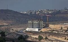 A building under construction is pictured in the West Bank settlement of Givat Ze'ev on October 24, 2025. (Ahmad GHARABLI / AFP)