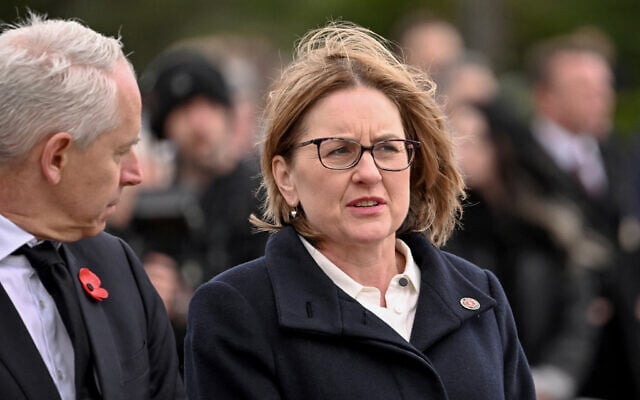FILE: Victoria's Premier Jacinta Allan (R) listens to a speech during a Remembrance Day service at the Shrine of Remembrance in Melbourne on November 11, 2025. (William WEST / AFP) FILE: Victoria's Premier Jacinta Allan (R) listens to a speech during a Remembrance Day service at the Shrine of Remembrance in Melbourne on November 11, 2025. (William WEST / AFP)