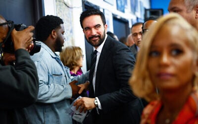 New York City mayor-elect Zohran Mamdani arrives at the National Action Network (NAN) Annual Thanksgiving Feeding event in Harlem, New York City, on November 27, 2025. (Kena Betancur / AFP)