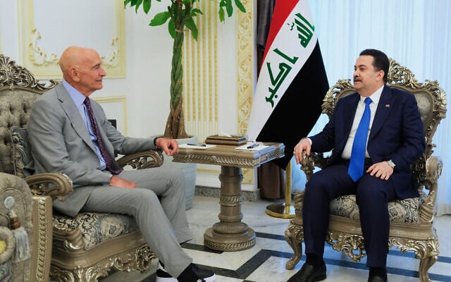 Iraqi Prime Minister Mohammed Shia al-Sudani (right), meets with the US envoy Tom Barrack, in Baghdad on November 30, 2025. (Handout / IRAQI PRIME MINISTER'S PRESS OFFICE / AFP) Iraqi Prime Minister Mohammed Shia al-Sudani (right), meets with the US envoy Tom Barrack, in Baghdad on November 30, 2025. (Handout / IRAQI PRIME MINISTER'S PRESS OFFICE / AFP)