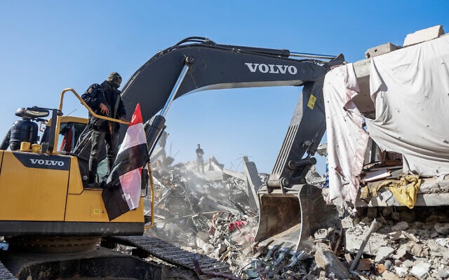 A digger is used to search for the last remaining body of a hostage in an operation overseen by Hamas and by Egyptian workers accompanied by members of the International Committee of the Red Cross (ICRC), in Jabalia refugee camp, in the northern Gaza Strip, on December 1, 2025. (Omar Al-Qattaa/AFP) A digger is used to search for the last remaining body of a hostage in an operation overseen by Hamas and by Egyptian workers accompanied by members of the International Committee of the Red Cross (ICRC), in Jabalia refugee camp, in the northern Gaza Strip, on December 1, 2025. (Omar Al-Qattaa/AFP)