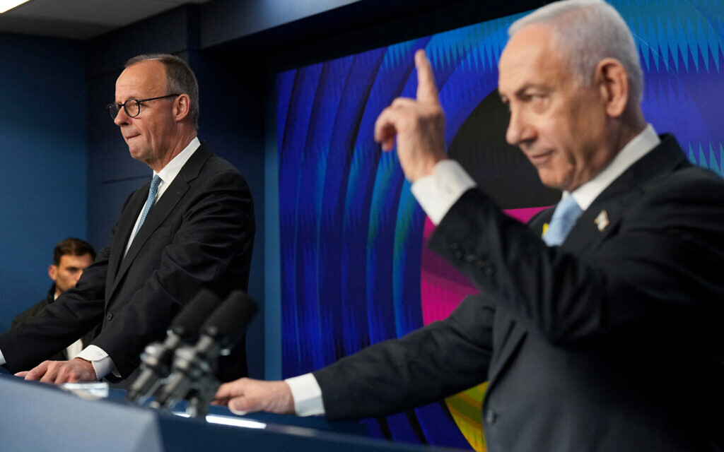 Prime Minister Benjamin Netanyahu (R) and German Chancellor Friedrich Merz attend a joint press conference in Jerusalem on December 7, 2025. (Photo by Ariel Schalit / POOL / AFP) Prime Minister Benjamin Netanyahu (R) and German Chancellor Friedrich Merz attend a joint press conference in Jerusalem on December 7, 2025. (Photo by Ariel Schalit / POOL / AFP)