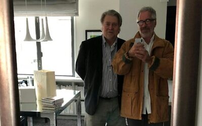 This undated photo from the personal collection of Jeffrey Epstein provided by the Democrats on the House Oversight Committee on December 12, 2025, shows former Trump adviser Steve Bannon (L) posing with Epstein. (HANDOUT / House Oversight Democrats / AFP)