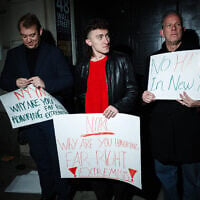 Protestors stand outside the New York Young Republican Club's 113th Annual Gala at Cipriani Wall Street on December 13, 2025, in New York City.   (Adam Gray / GETTY IMAGES NORTH AMERICA / Getty Images via AFP)
