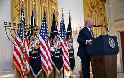 US President Donald Trump speaks during a Hanukkah reception in the East Room of the White House in Washington, DC, on December 16, 2025. (ANDREW CABALLERO-REYNOLDS / AFP)