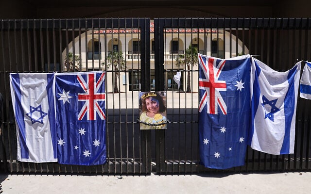 A poster of 10-year-old Matilda, who was killed in the Bondi Beach terror attack, is hung next to flags of Australia and Israel on the gate of the Bondi Pavilion, in Sydney on December 18, 2025. (David Gray/AFP) A poster of 10-year-old Matilda, who was killed in the Bondi Beach terror attack, is hung next to flags of Australia and Israel on the gate of the Bondi Pavilion, in Sydney on December 18, 2025. (David Gray/AFP)