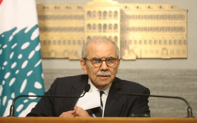 A photograph released by the Lebanese government press office on December 19, 2025 show Lebanon's Prime Minister Nawaf Salam speaking during a press conference in Beirut, Lebanon. (HANDOUT / Lebanese Government Press Office / AFP) A photograph released by the Lebanese government press office on December 19, 2025 show Lebanon's Prime Minister Nawaf Salam speaking during a press conference in Beirut, Lebanon. (HANDOUT / Lebanese Government Press Office / AFP)
