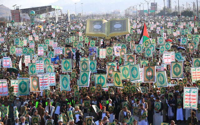 Yemenis brandish copies of the Koran during a demonstration over remarks made by a candidate for US Senate on the Koran in the Yemeni capital, Sanaa, which is under Houthi control, on December 19, 2025. (Mohammed HUWAIS / AFP) Yemenis brandish copies of the Koran during a demonstration over remarks made by a candidate for US Senate on the Koran in the Yemeni capital, Sanaa, which is under Houthi control, on December 19, 2025. (Mohammed HUWAIS / AFP)