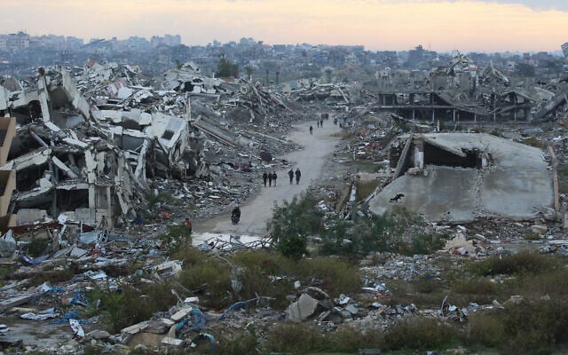 A general view of destroyed houses in the Nuseirat camp in the central Gaza Strip on December 19, 2025. (Eyad Baba / AFP)