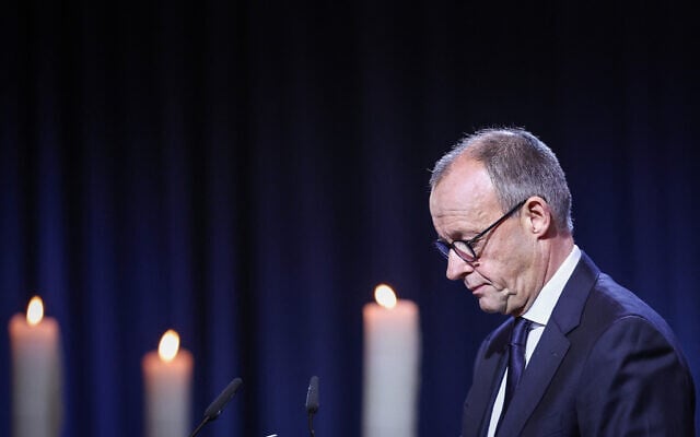 German Chancellor Friedrich Merz attends a commemorative ceremony at St. John's Church (Johanniskirche) one year after a deadly SUV rampage in which six people were killed and more than 300 wounded at the Christmas market in Magdeburg, eastern Germany, on December 20, 2025. (Ronny HARTMANN / AFP) German Chancellor Friedrich Merz attends a commemorative ceremony at St. John's Church (Johanniskirche) one year after a deadly SUV rampage in which six people were killed and more than 300 wounded at the Christmas market in Magdeburg, eastern Germany, on December 20, 2025. (Ronny HARTMANN / AFP)