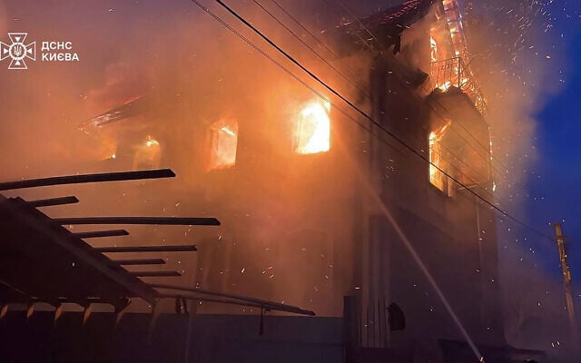 This handout photograph taken and released by the Ukrainian Emergency Service on December 27, 2025, shows a building damaged during a Russian drone and missile attack in Kyiv. (Photo by Handout / UKRAINIAN EMERGENCY SERVICE / AFP) This handout photograph taken and released by the Ukrainian Emergency Service on December 27, 2025, shows a building damaged during a Russian drone and missile attack in Kyiv. (Photo by Handout / UKRAINIAN EMERGENCY SERVICE / AFP)