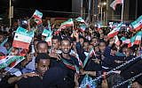 Residents wave Somaliland flags as they gather to celebrate Israel’s announcement recognizing Somaliland’s statehood in downtown Hargeisa, December 26, 2025. (FARHAN ALELI / AFP)