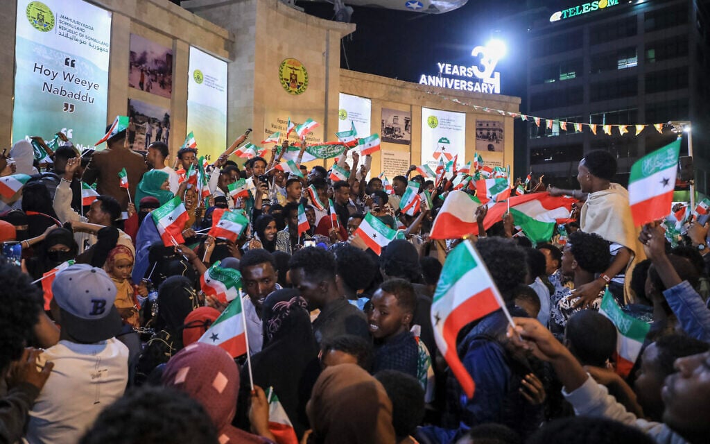 Residents wave Somaliland flags as they gather to celebrate Israel's recognition of Somaliland in downtown Hargeisa, December 26, 2025. (Farhan Aleli/AFP) Residents wave Somaliland flags as they gather to celebrate Israel's recognition of Somaliland in downtown Hargeisa, December 26, 2025. (Farhan Aleli/AFP)