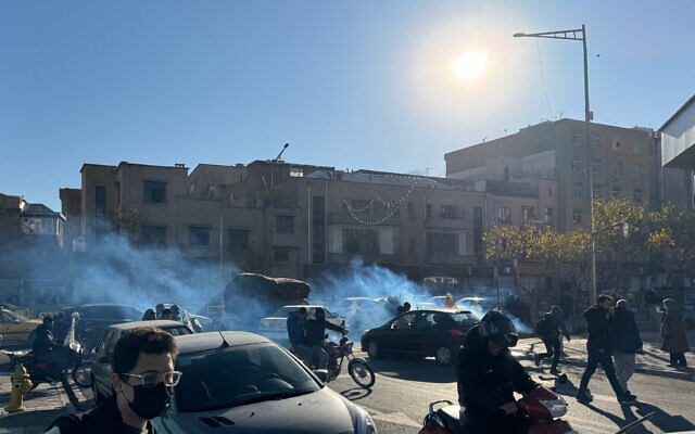 Shopkeepers and traders protest in the street against the economic conditions and Iran's embattled currency in Tehran on December 29, 2025. Some shopkeepers in Tehran closed their stores on December 29 in protest against economic hardships and sharp swings in Iran's embattled currency, Iranian media reported, following similar demonstrations a day earlier. Iran's currency has hit new lows on the unofficial market, with the US dollar trading at around 1.42 million rials on Sunday, compared to 820,000 rials a year ago and the euro nearing 1.7 million rials, according to price monitoring websites. (Photo by HANDOUT / FARS NEWS AGENCY / AFP)