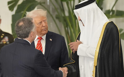 Qatar's Emir Sheikh Tamim bin Hamad Al Thani shakes hands with White House Special Envoy Steve Witkoff, as they speak with President Donald Trump before a state dinner at Lusail Palace in Doha, Qatar, May 14, 2025. (AP Photo/Alex Brandon) Qatar's Emir Sheikh Tamim bin Hamad Al Thani shakes hands with White House Special Envoy Steve Witkoff, as they speak with President Donald Trump before a state dinner at Lusail Palace in Doha, Qatar, May 14, 2025. (AP Photo/Alex Brandon)