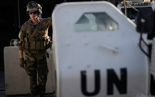 A French UN peacekeeper stands beside an armored vehicle at his base, waiting to move with his unit for a patrol along the Lebanese-Israeli border in Deir Kifa, southern Lebanon, August 20, 2025. (AP Photo/Hussein Malla) A French UN peacekeeper stands beside an armored vehicle at his base, waiting to move with his unit for a patrol along the Lebanese-Israeli border in Deir Kifa, southern Lebanon, August 20, 2025. (AP Photo/Hussein Malla)