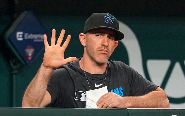 Alon Leichman, then with the Miami Marlins, gestures signs toward catcher Agustín Ramírez during the eighth inning of a US baseball game on September 20, 2025, in Arlington, Texas. (AP/Julio Cortez) Alon Leichman, then with the Miami Marlins, gestures signs toward catcher Agustín Ramírez during the eighth inning of a US baseball game on September 20, 2025, in Arlington, Texas. (AP/Julio Cortez)