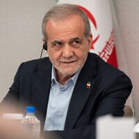 Iran's President Masoud Pezeshkian takes questions from the media at a press briefing in New York, September 26, 2025. (Angelina Katsanis/AP)